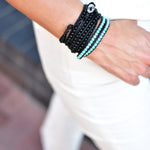 Black Beads on Black Leather Wrap Bracelet on wrist