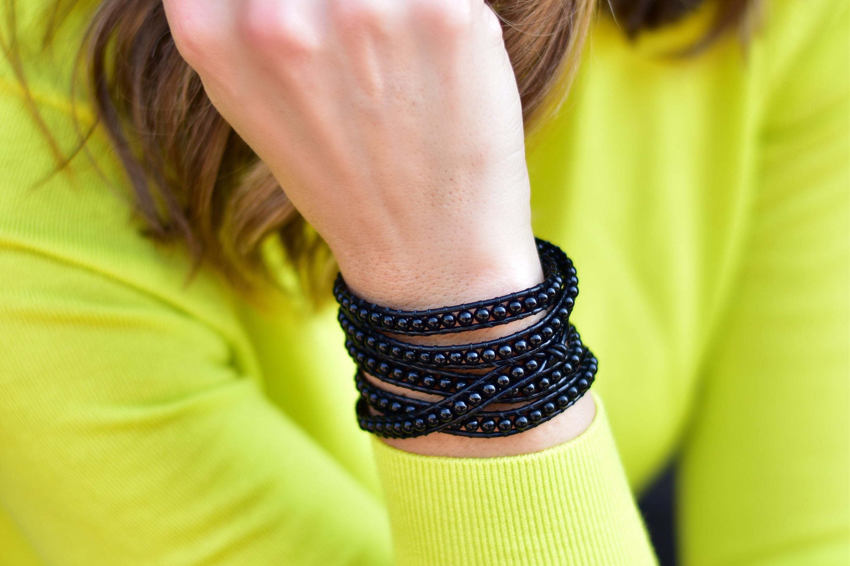 Black Beads on Black Leather Wrap Bracelet on wrist