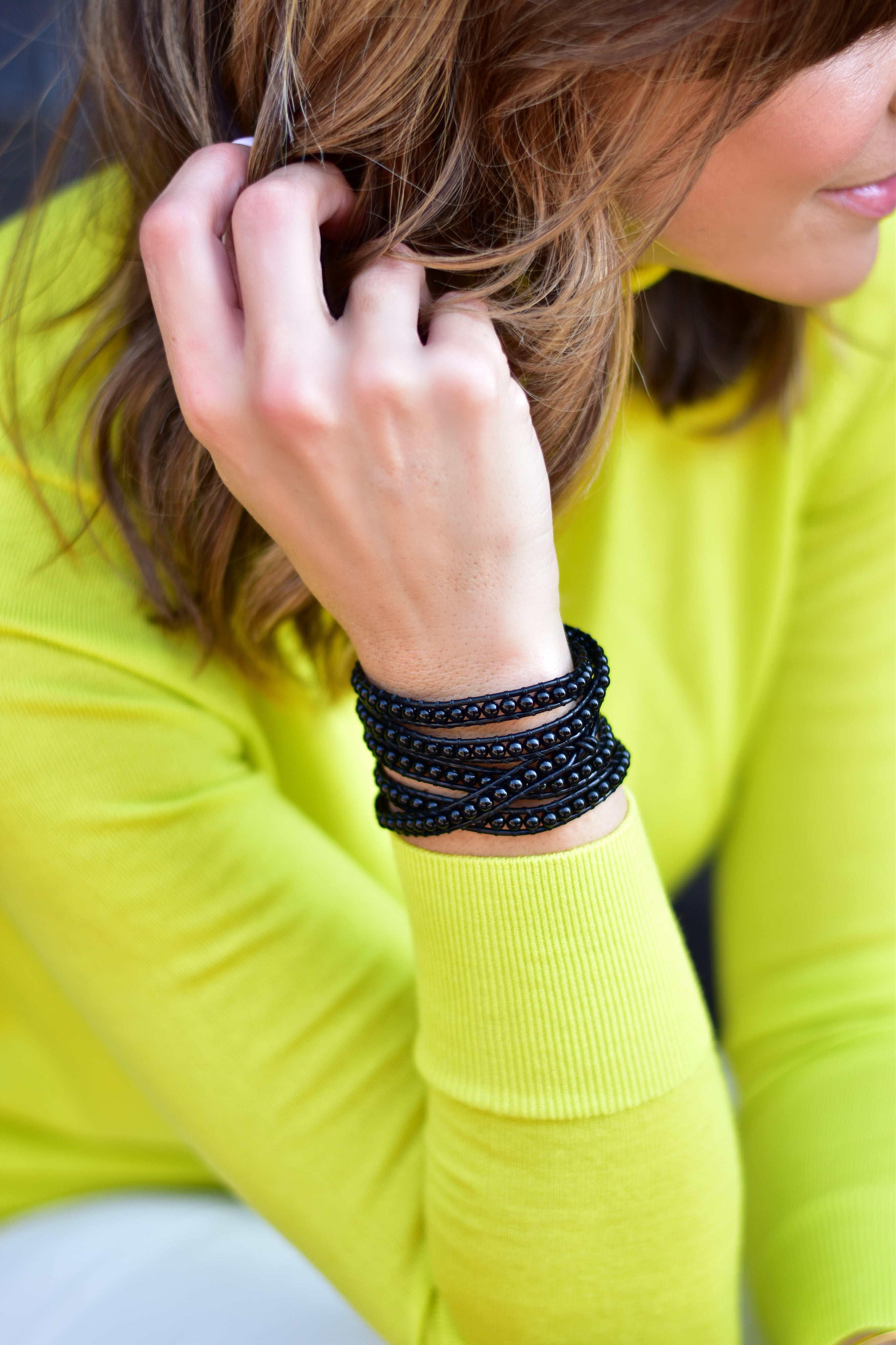 Black Beads on Black Leather Wrap Bracelet on wrist