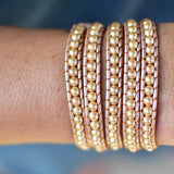 Champagne Pearls on Champagne Leather Wrap Bracelet on wrist