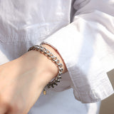 Silver Chunky Cuban Chain Bracelet on wrist.