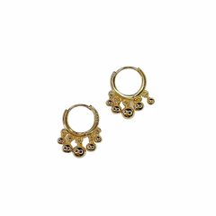 Small gold hoop with tasseled gold beads.