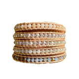 5 layer wrap bracelet with champagne leather, and clear crystals and neutral beads.